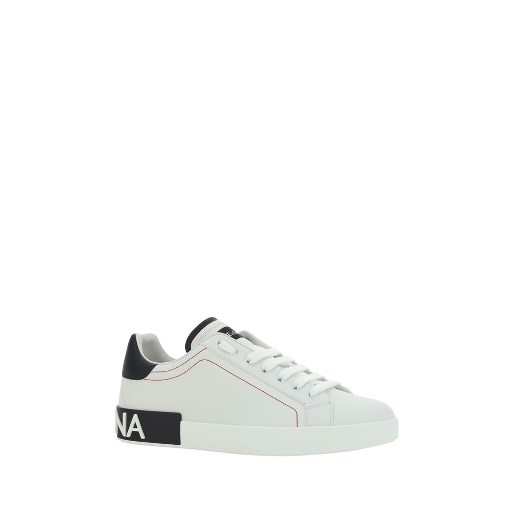 Dolce & Gabbana white calf leather Bos Taurus low top sneakers with sleek design and subtle branding details.