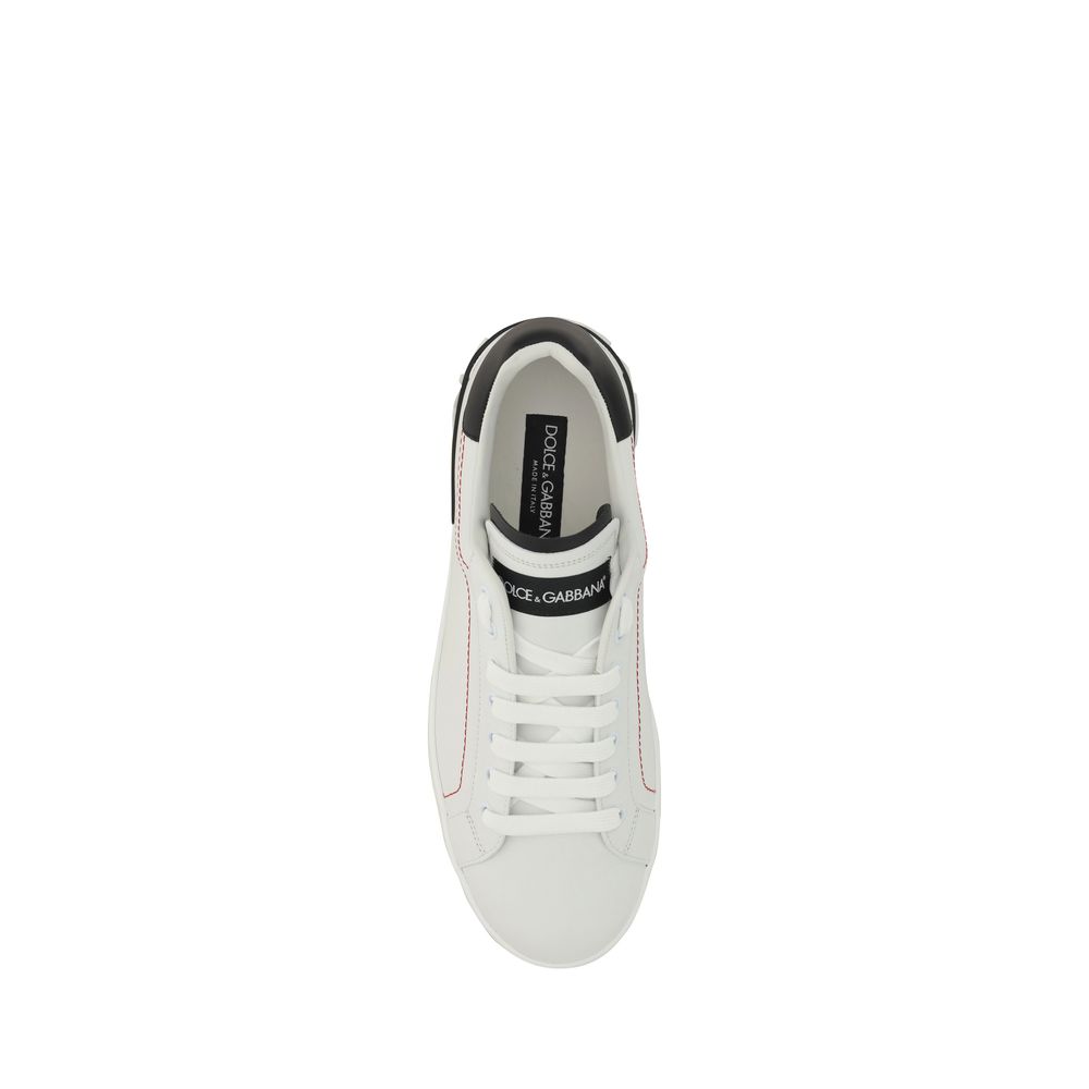 Dolce & Gabbana white calf leather Bos Taurus low top sneakers with lace-up design and branded details.