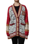 Multicolor floral lace cardigan sweater by Dolce & Gabbana with intricate flower patterns and delicate lace details.