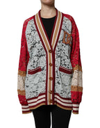 Multicolor floral lace cardigan sweater by Dolce & Gabbana with intricate flower patterns and delicate lace details.