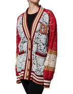 Multicolor floral lace cardigan sweater by Dolce & Gabbana featuring intricate lace details and a vibrant floral pattern.