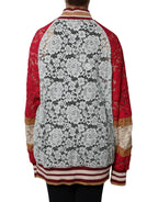 Multicolor floral lace cardigan sweater by Dolce & Gabbana with intricate lace details and vibrant floral patterns.