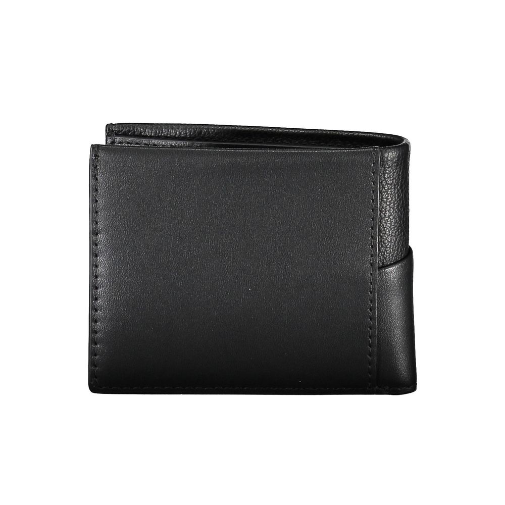 Black Calvin Klein men's wallet made of polyester, featuring a sleek design with multiple card slots and a minimalist style.