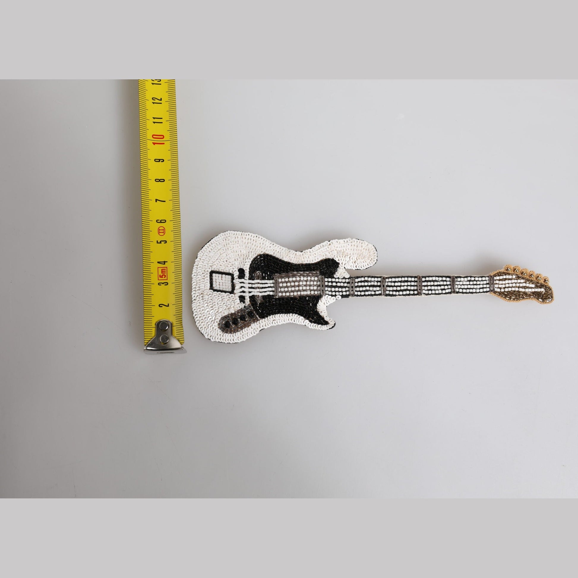 Dolce & Gabbana Gold Brass Logo Beaded Guitar Pin Brooch