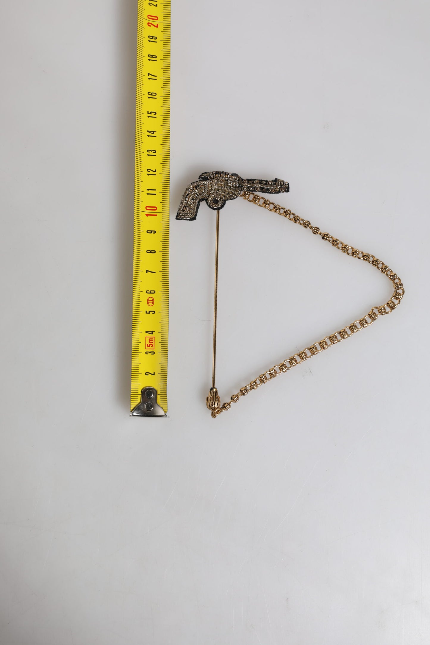 Dolce & Gabbana Black Gold Brass Copper Revolver Brooch Lapel Pin Dolce & Gabbana