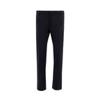 Valentino Garavani black wool dress pants featuring a tailored fit and classic design, ideal for formal or business attire.