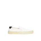 White Saint Laurent cotton low top sneakers with laces and minimal design, perfect for casual style.