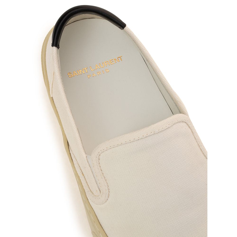 White Saint Laurent cotton low top sneakers with rounded toe and flat rubber sole, stylish casual footwear for men and women.