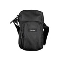 Black Calvin Klein shoulder bag with chic detailing, featuring elegant design and stylish accents for versatile fashion.