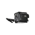 Black Calvin Klein women's shoulder bag made of polyester with sleek design and adjustable strap.