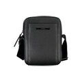 Calvin Klein black shoulder bag with sleek design and logo detail, featuring a structured shape and adjustable strap.