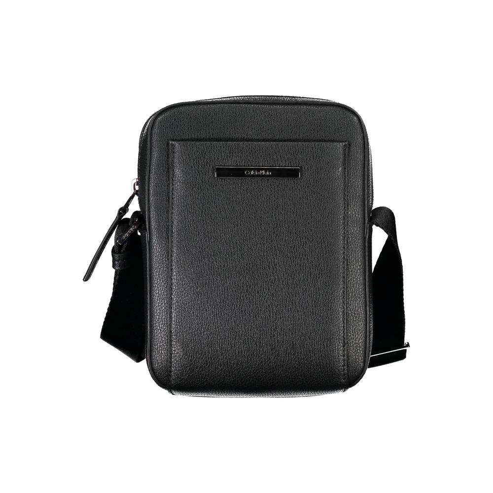Calvin Klein black shoulder bag with sleek design and logo detail, featuring a structured shape and adjustable strap.
