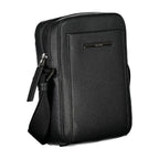 Calvin Klein sleek black shoulder bag with logo detail, featuring a minimalist design and adjustable strap.