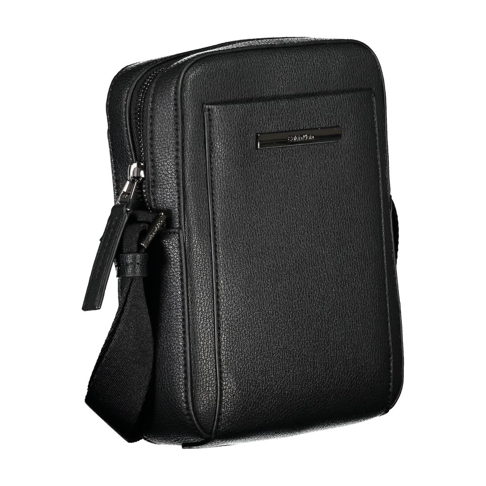Calvin Klein sleek black shoulder bag with logo detail, featuring a minimalist design and adjustable strap.