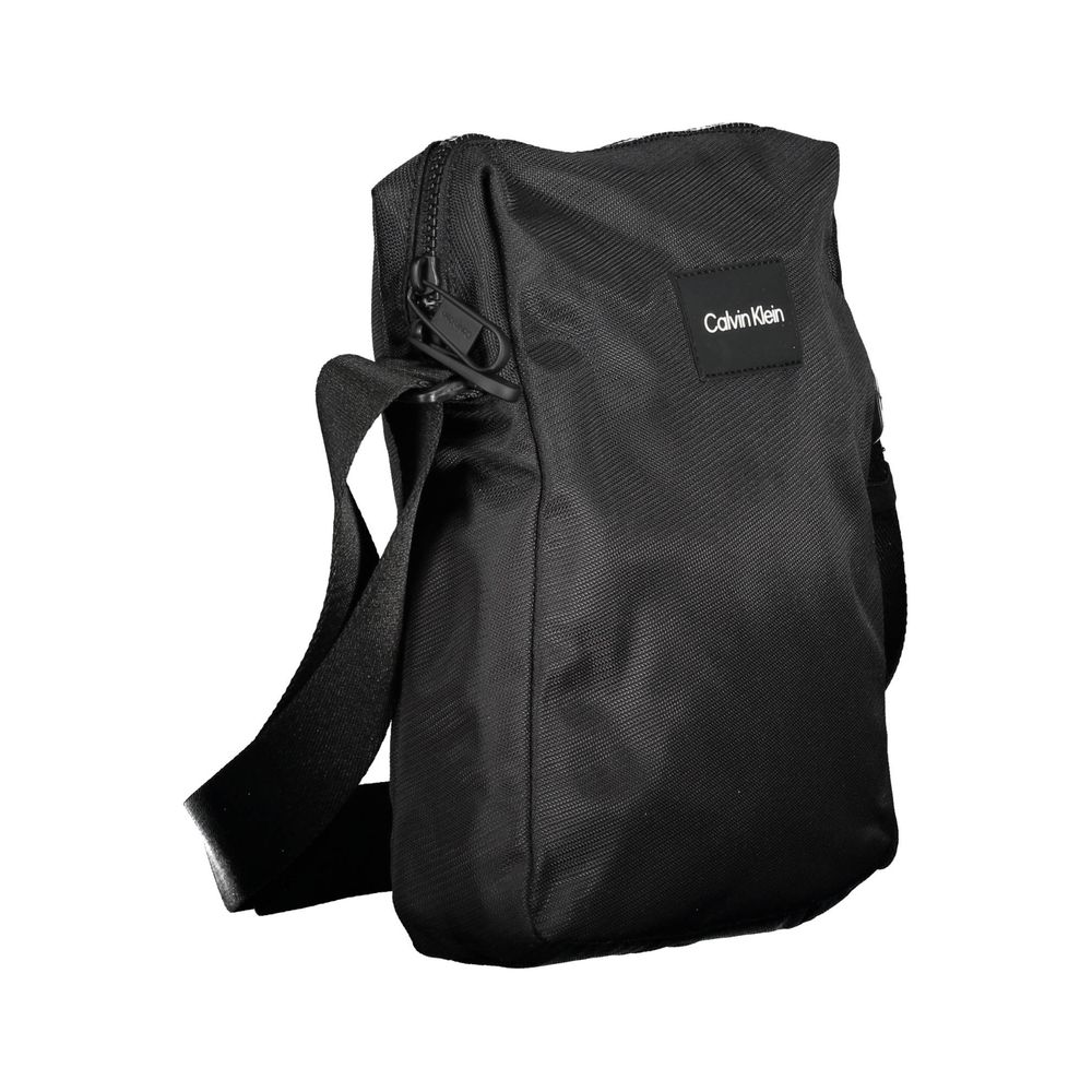 Calvin Klein black polyester men's shoulder bag with adjustable strap and sleek design.