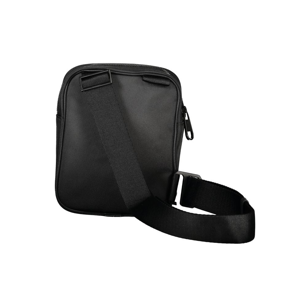 Black Calvin Klein polyester men's shoulder bag with adjustable strap and sleek design, ideal for everyday use.