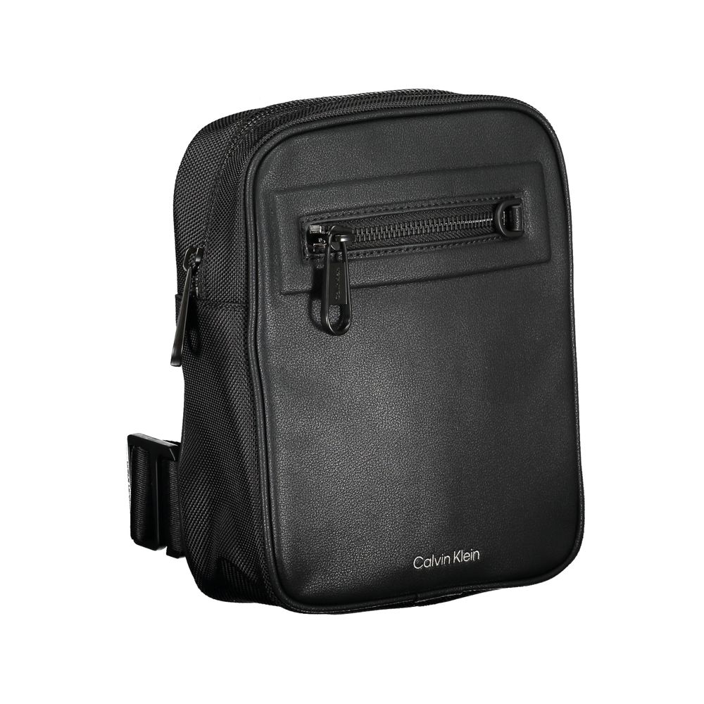 Calvin Klein black polyester men's shoulder bag with adjustable strap and sleek design, suitable for casual or professional use.
