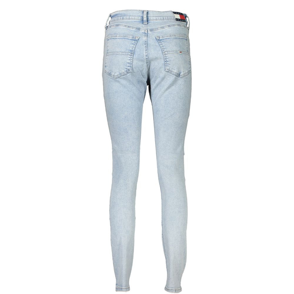 Tommy Hilfiger Azzurro cotton women's jeans with classic five-pocket design and belt loops, styled on a hanger.