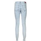 Tommy Hilfiger Azzurro cotton women's jeans with classic five-pocket design and belt loops, styled on a hanger.