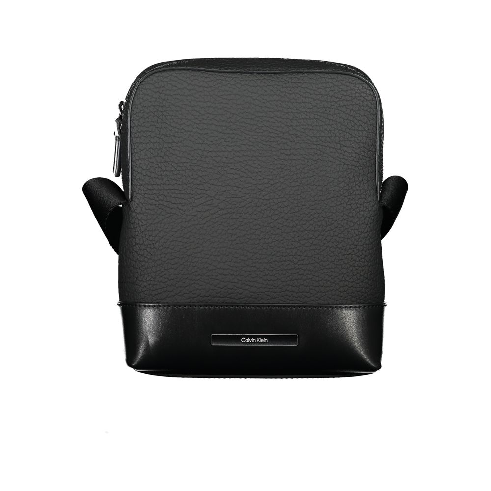Calvin Klein sleek black shoulder bag with contrasting details, featuring a modern design and adjustable strap.