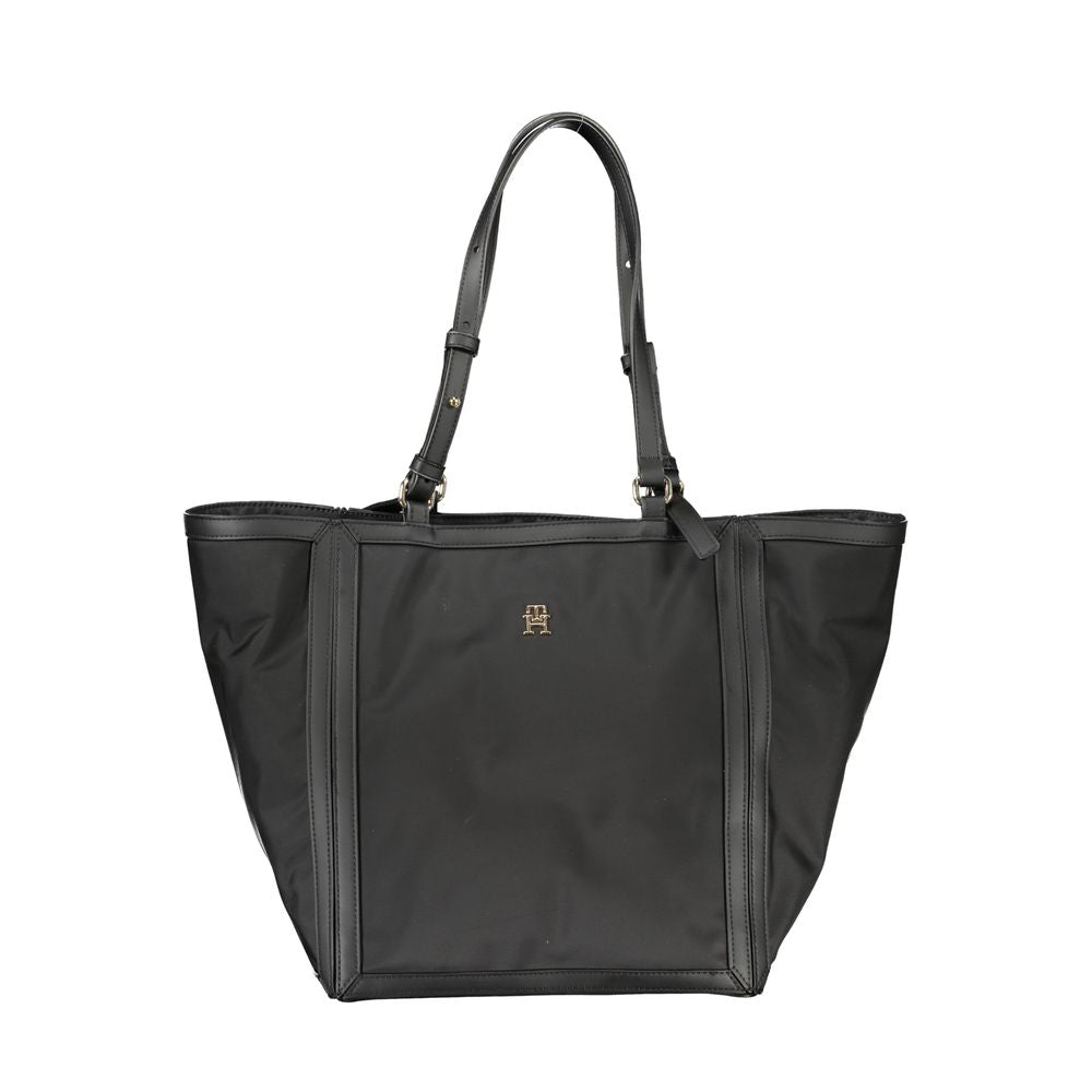 Tommy Hilfiger black polyester women's handbag with top handles and silver hardware, stylish and functional accessory.