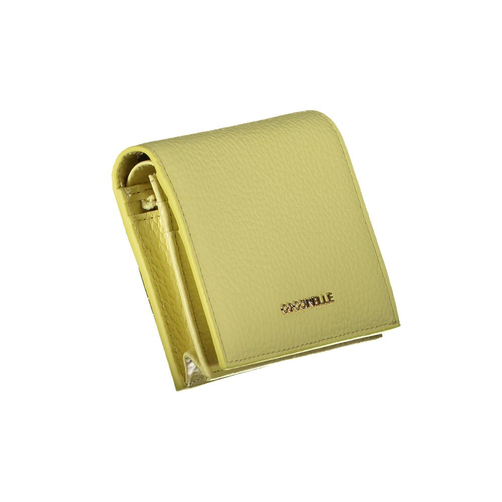 Coccinelle Giallo leather women's wallet with gold-tone hardware and multiple card slots, displayed on a neutral background.
