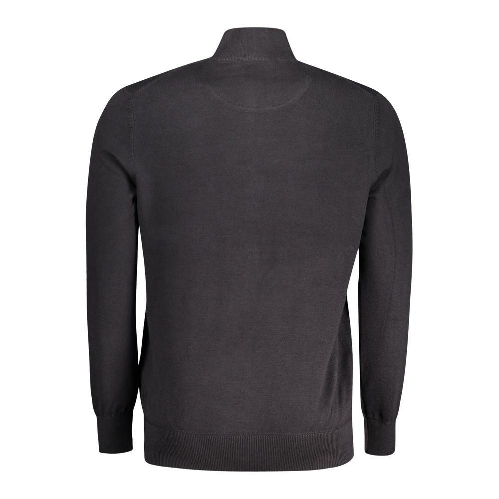 Timberland black organic cotton men's cardigan with button closure, soft knit fabric, and ribbed cuffs and hem.