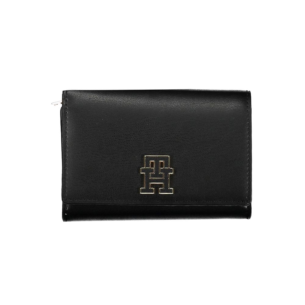 Tommy Hilfiger black polyurethane women’s wallet with sleek design and multiple card slots, featuring the iconic logo.