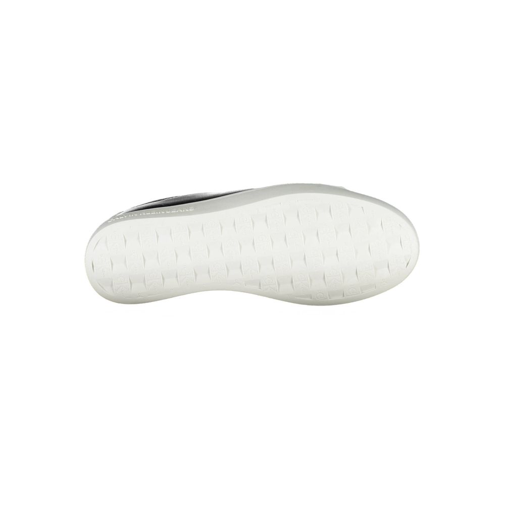 Calvin Klein Nero polyester women’s sneaker with sleek design and white rubber sole, ideal for casual or sporty outfits.