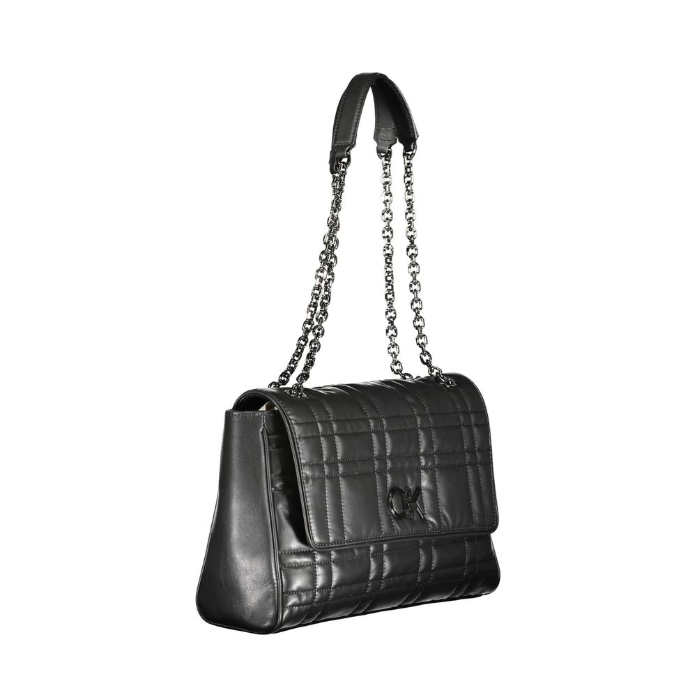 Calvin Klein Nero polyester women's handbag with sleek design and silver hardware, featuring adjustable straps and spacious interior.