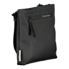 Calvin Klein black polyester men's shoulder bag with adjustable strap and zippered compartments.