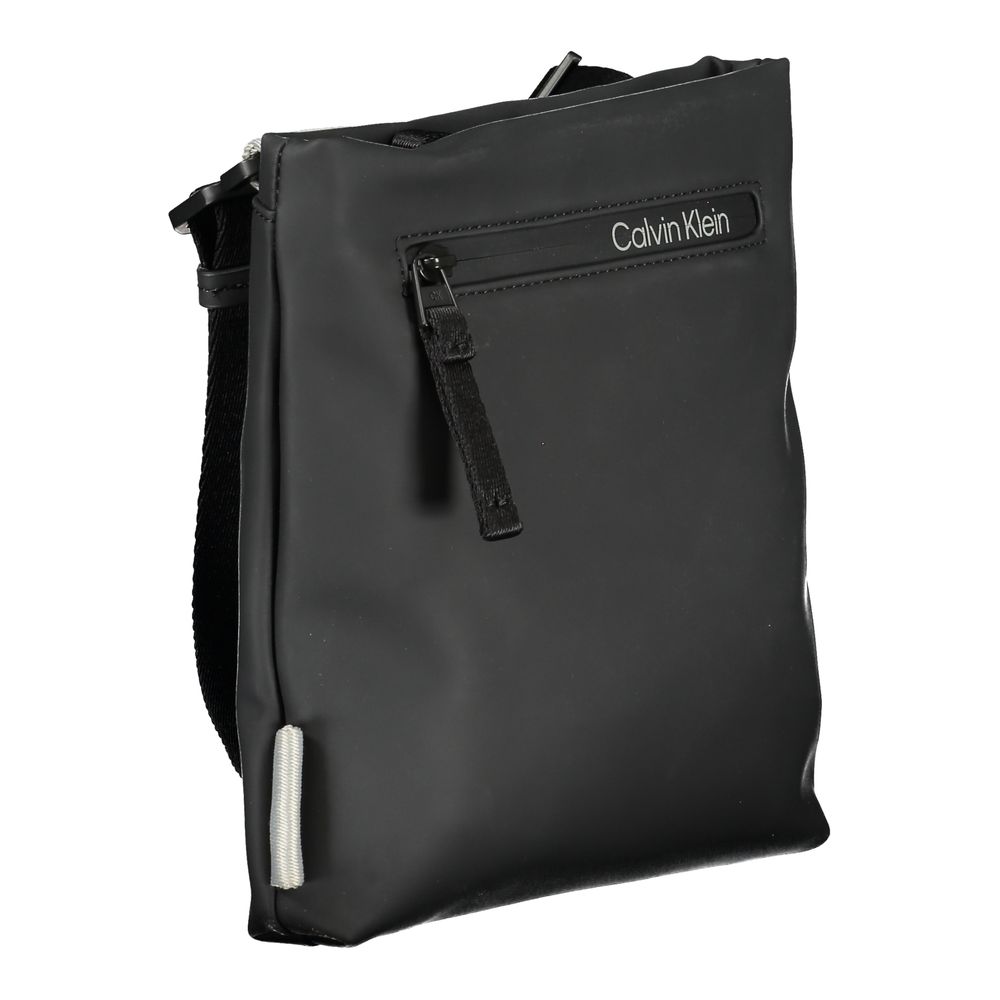 Calvin Klein black polyester men's shoulder bag with adjustable strap and zippered compartments.