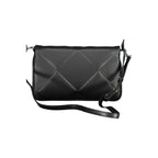 Black Calvin Klein polyurethane women's handbag with sleek design and silver hardware, featuring a top handle and spacious interior.