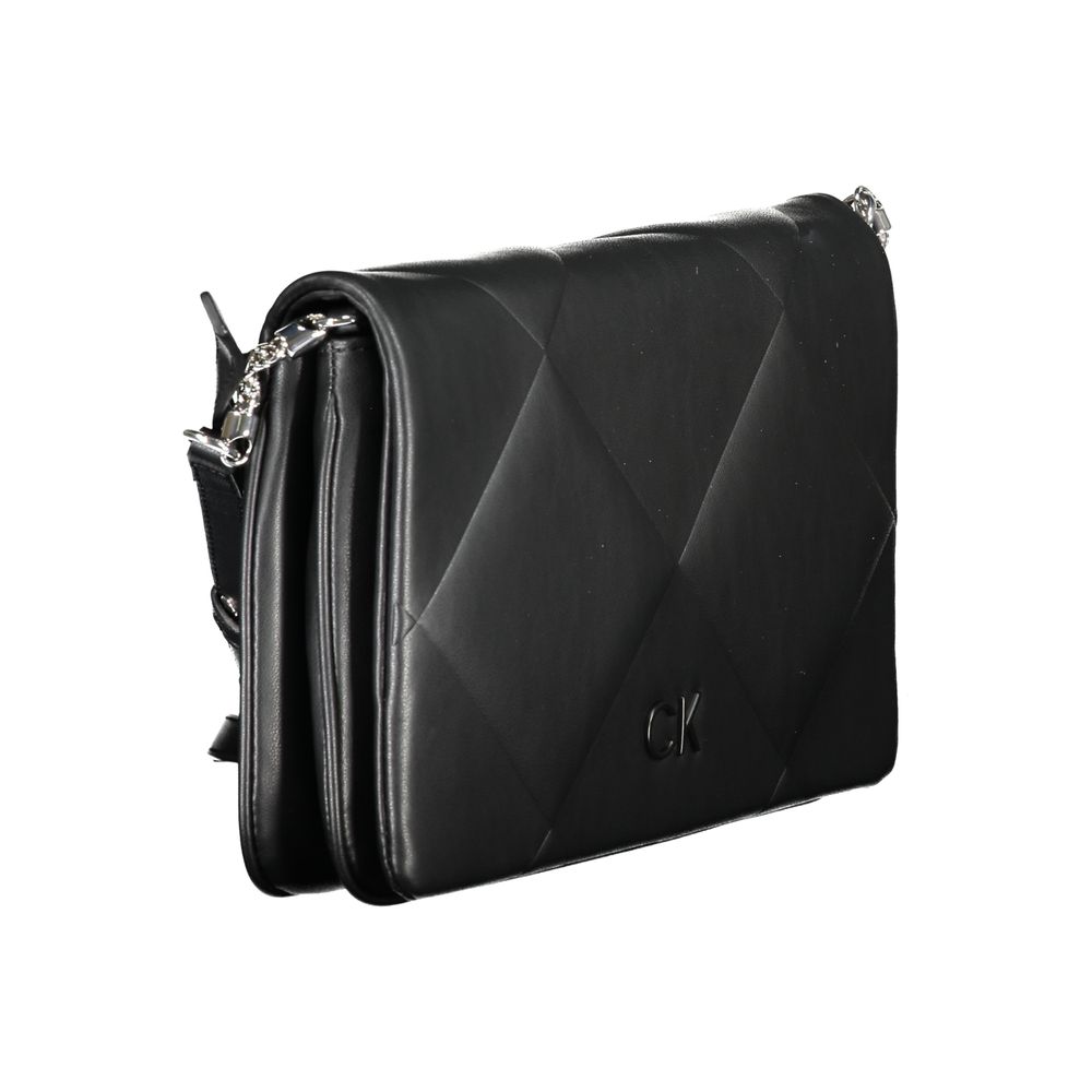 Calvin Klein black polyurethane women's handbag with sleek design and silver hardware, stylish accessory for everyday use.