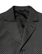 Dark gray Dolce & Gabbana men's patterned suit blazer with white accents, tailored fit, and classic lapel design.