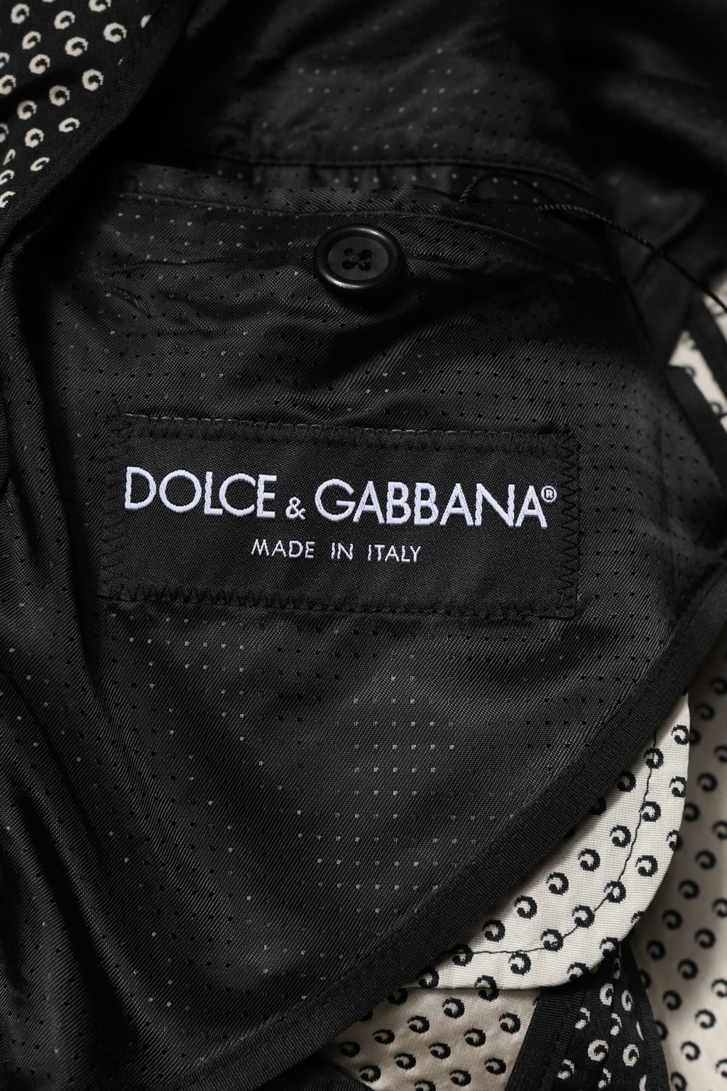 Dark gray and white patterned Dolce & Gabbana men's suit blazer with tailored fit and classic lapel.