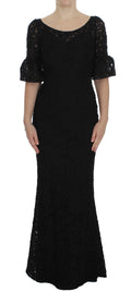 Dolce & Gabbana black floral lace long bodycon maxi dress displayed on a dress form, showcasing intricate lace details and fitted silhouette.