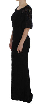 Dolce & Gabbana black floral lace long bodycon maxi dress with fitted silhouette and intricate lace details.