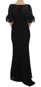 Dolce & Gabbana black floral lace long bodycon maxi dress on a model, showcasing elegant evening wear design.