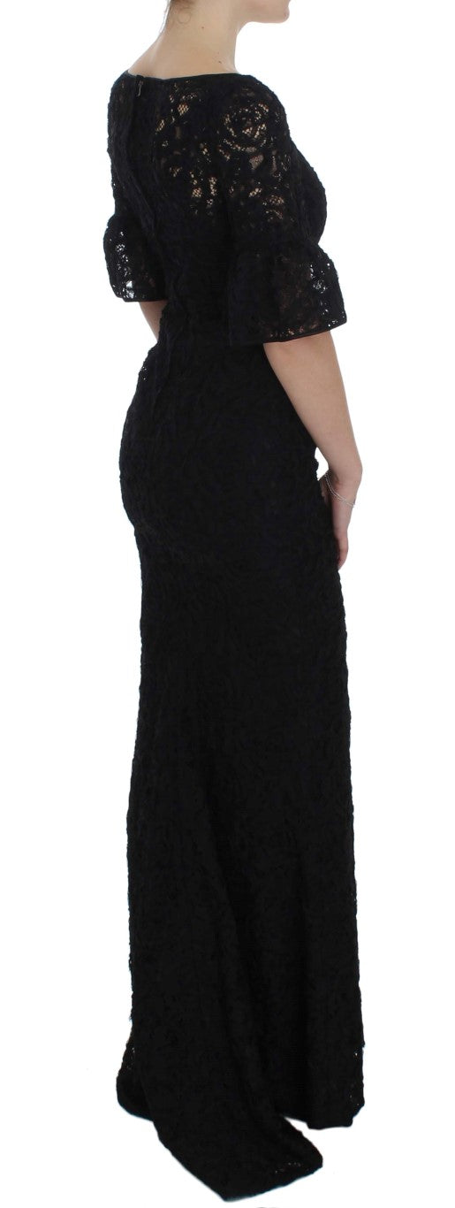 Dolce & Gabbana black floral lace long bodycon maxi dress displayed on a model with intricate lace details and a sleek silhouette.