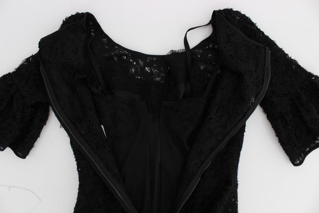 Dolce & Gabbana black floral lace long bodycon maxi dress displayed on a model, showcasing elegant floral lace details.