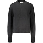 Black Calvin Klein women's cotton sweater with a classic fit and ribbed cuffs, shown on a neutral background.