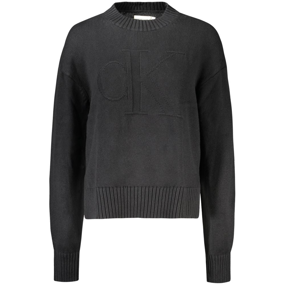 Black Calvin Klein women's cotton sweater with a classic fit and ribbed cuffs, shown on a neutral background.