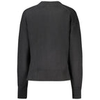 Black cotton women's sweater by Calvin Klein, soft knit with long sleeves and a classic crew neckline.