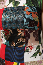 Dolce & Gabbana multicolor patchwork sleeveless sheath dress with vibrant pattern and fitted silhouette.
