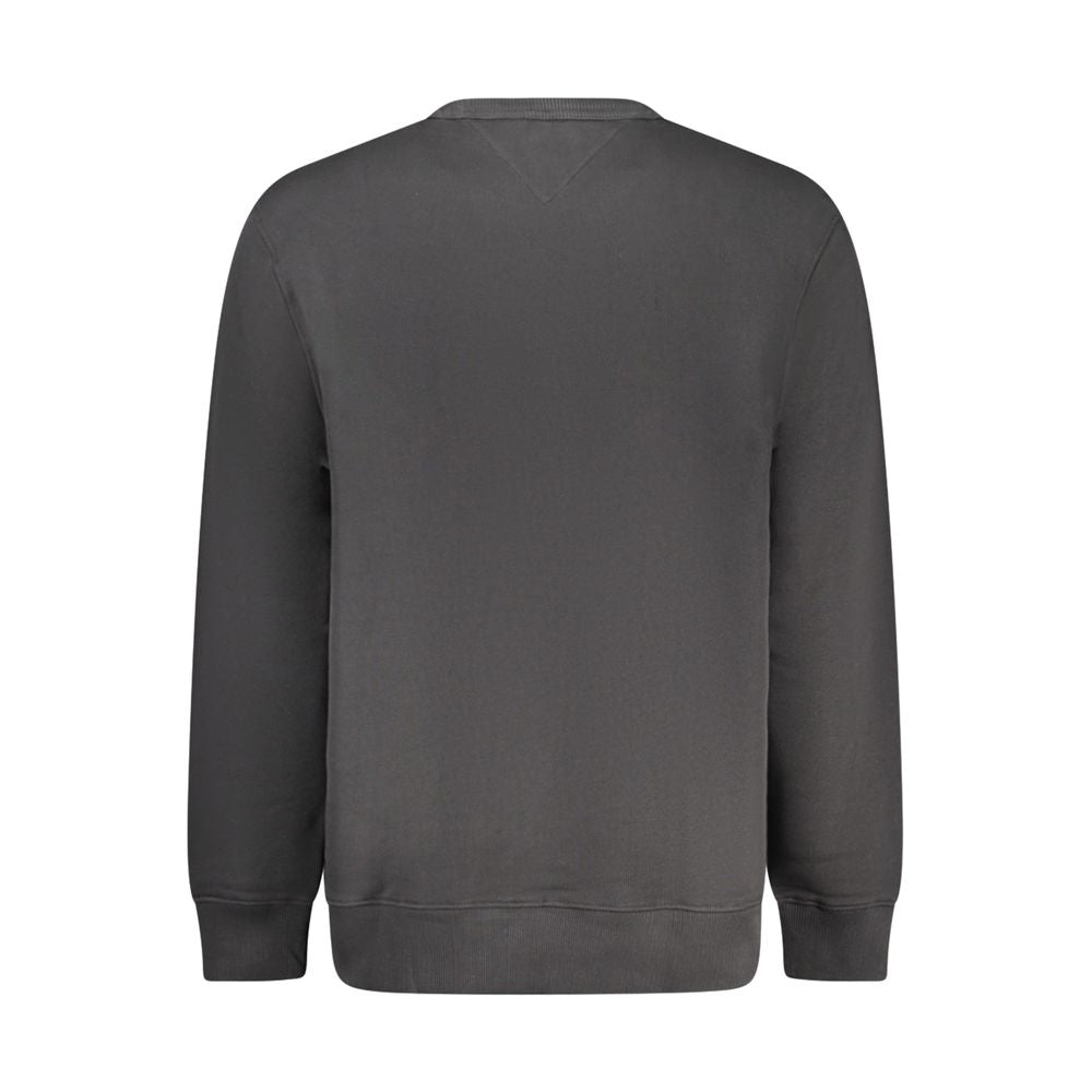 Black cotton men's sweatshirt by Tommy Hilfiger with a crew neck and subtle logo detail, displayed on a plain background.