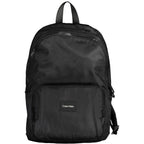Calvin Klein black polyester men's backpack with adjustable straps and multiple compartments, front logo detail.