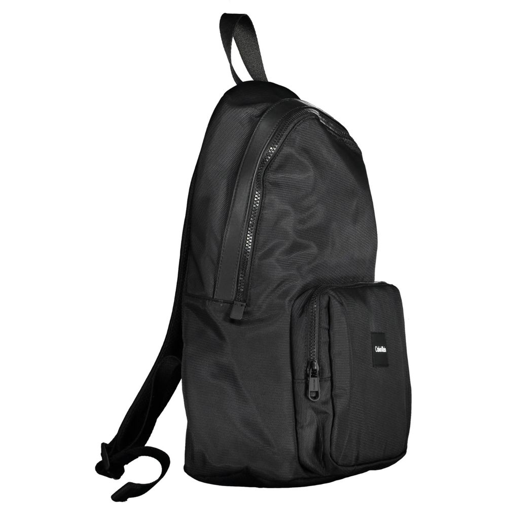 Calvin Klein black polyester men's backpack with adjustable straps and front zip pocket, stylish and functional for daily use.