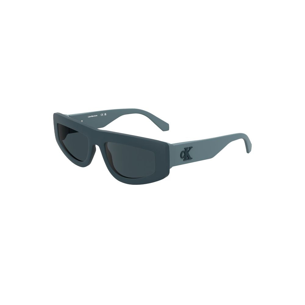 Calvin Klein Blue Bio Women sunglasses with round blue-tinted lenses and slim metal frame on a white background.