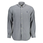 U.S. POLO ASSN. men's blue cotton shirt with collar and button front, displayed flat for a casual, stylish look.